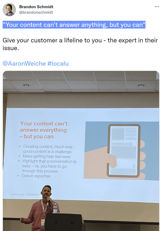 Conference speaker Aaron Weiche presents slide stating that your content can't answer everything, but you can.