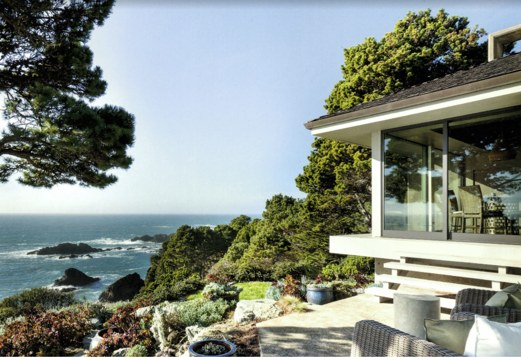 A gorgeous photo of a remodeled room overlooking the sea