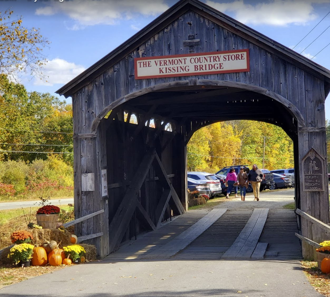 A picturesque covered bridge in Vermont makes a great selfie photo opportunity